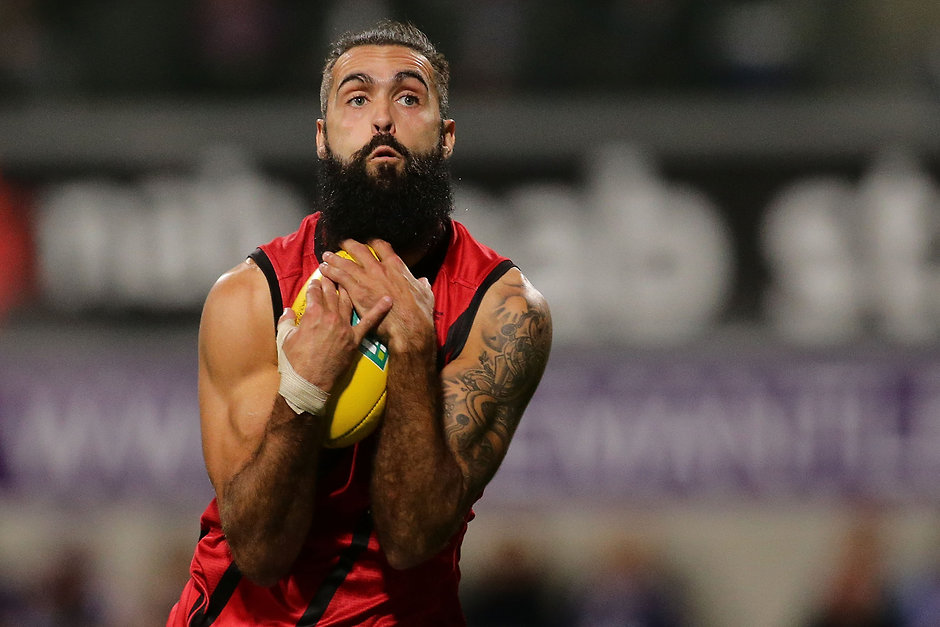 AFL 2016 Rd 11 - Fremantle v Essendon PERTH, AUSTRALIA - JUNE 04: Courtenay Dempsey of the Bombers marks the ball during the 2016 AFL Round 11 match between the Fremantle Dockers and the Essendon Bombers at Domain Stadium on June 4, 2016 in Perth, Australia. (Photo by Will Russell/AFL Media)